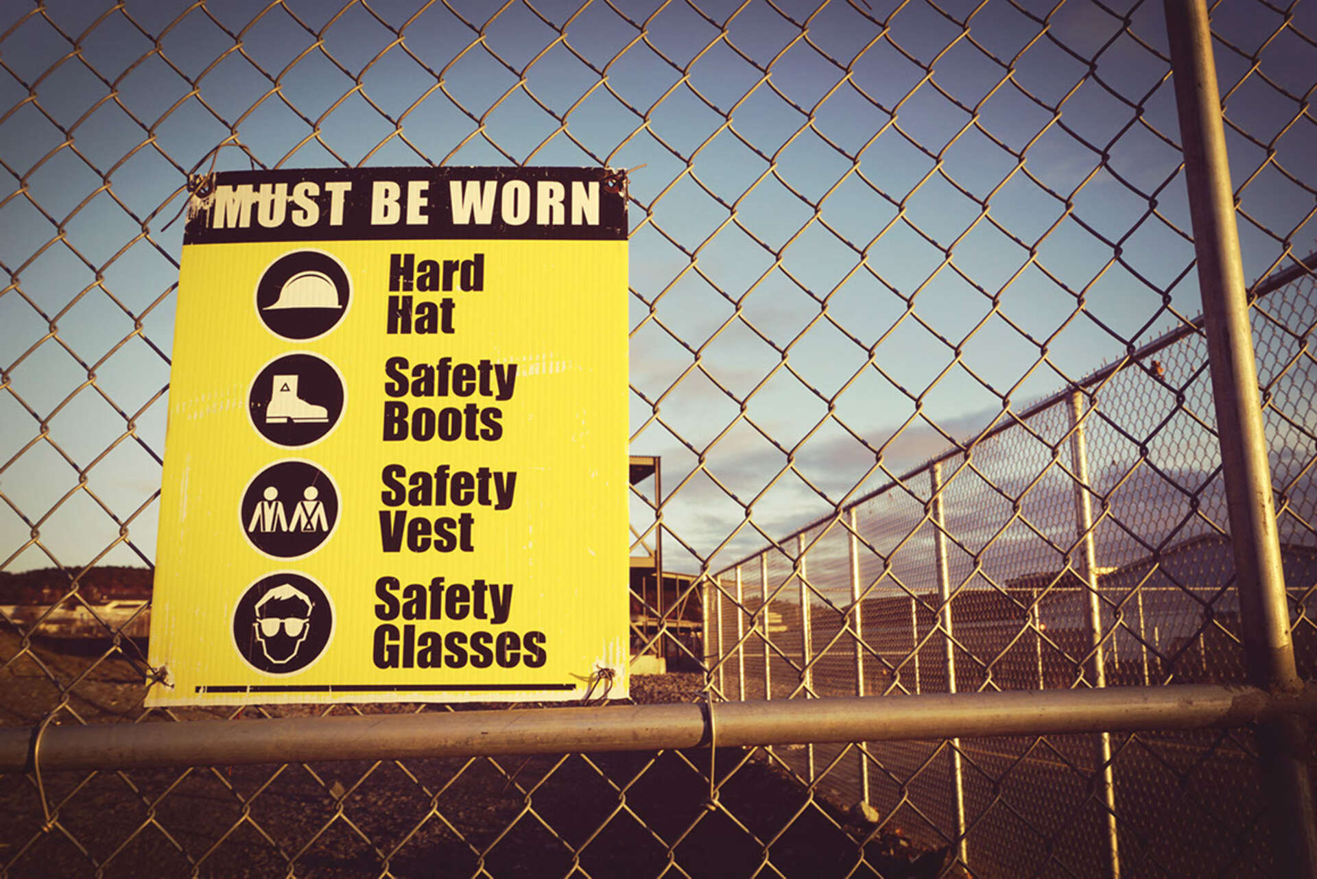 photo of safety sign illustrating what safety equipment must be worn